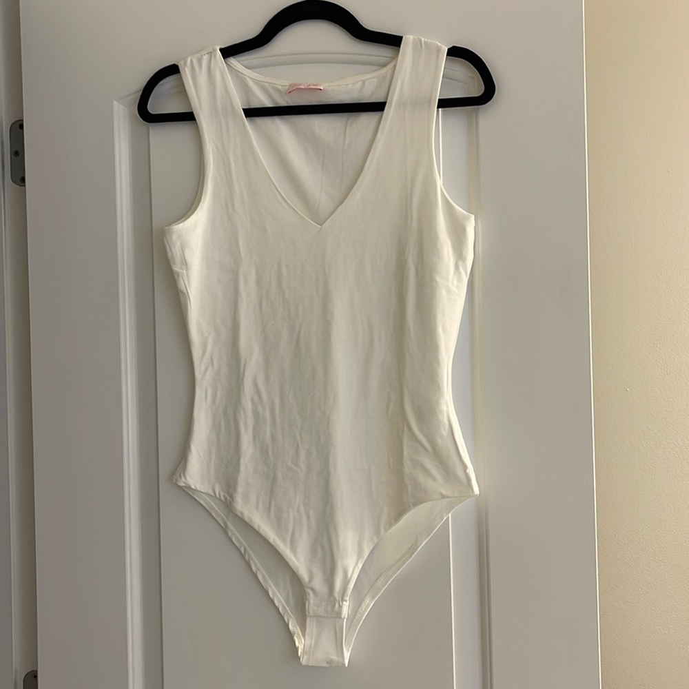 Pink lily white bodysuit V-neck